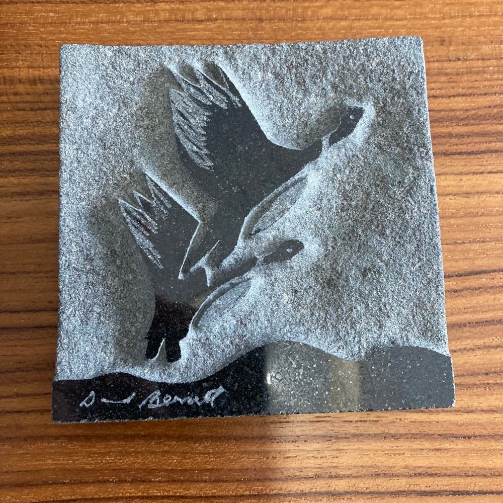 Sculpted granite tile art